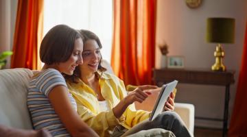 Couple researching local authority fostering