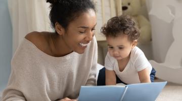 Foster carer with a child in a spare bedroom
